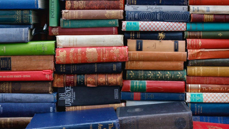 stack of books - image by ed robertson  unsplash 